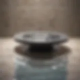 Illustration of a shower drain with water pooling around it