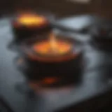 Close-up view of a clean flat surface stove reflecting light