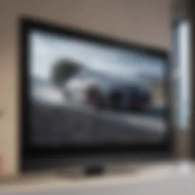 Close-up view of a flat screen TV being cleaned