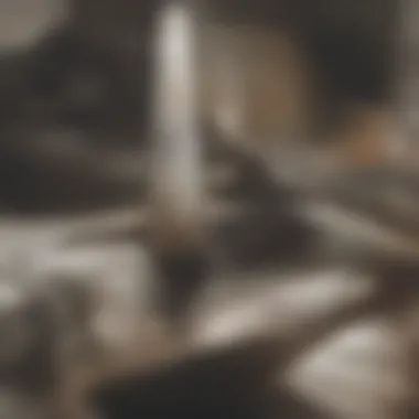 Using a plunger to address a sink blockage Plunger positioned over drain