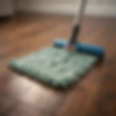Close-up of a microfiber mop on a hardwood surface