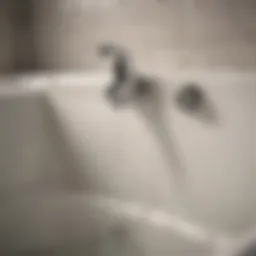 A clogged bathtub drain with hair and soap residue.