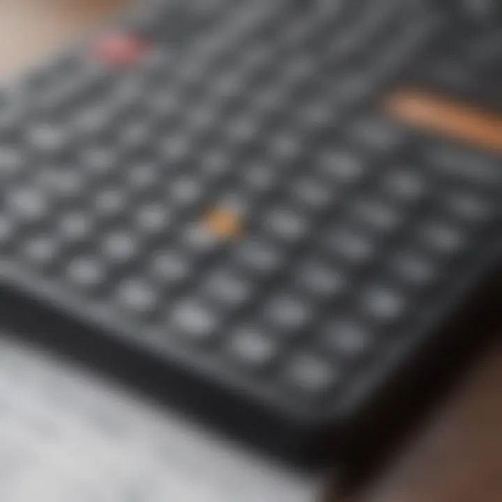 Close-up of a financial calculator with rental property investment spreadsheets.