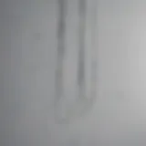 Close-up of wire hanging technique for artwork