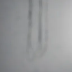 Close-up of wire hanging technique for artwork