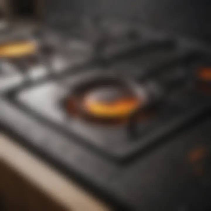 Close-up of tough stains on a flat stove top being treated